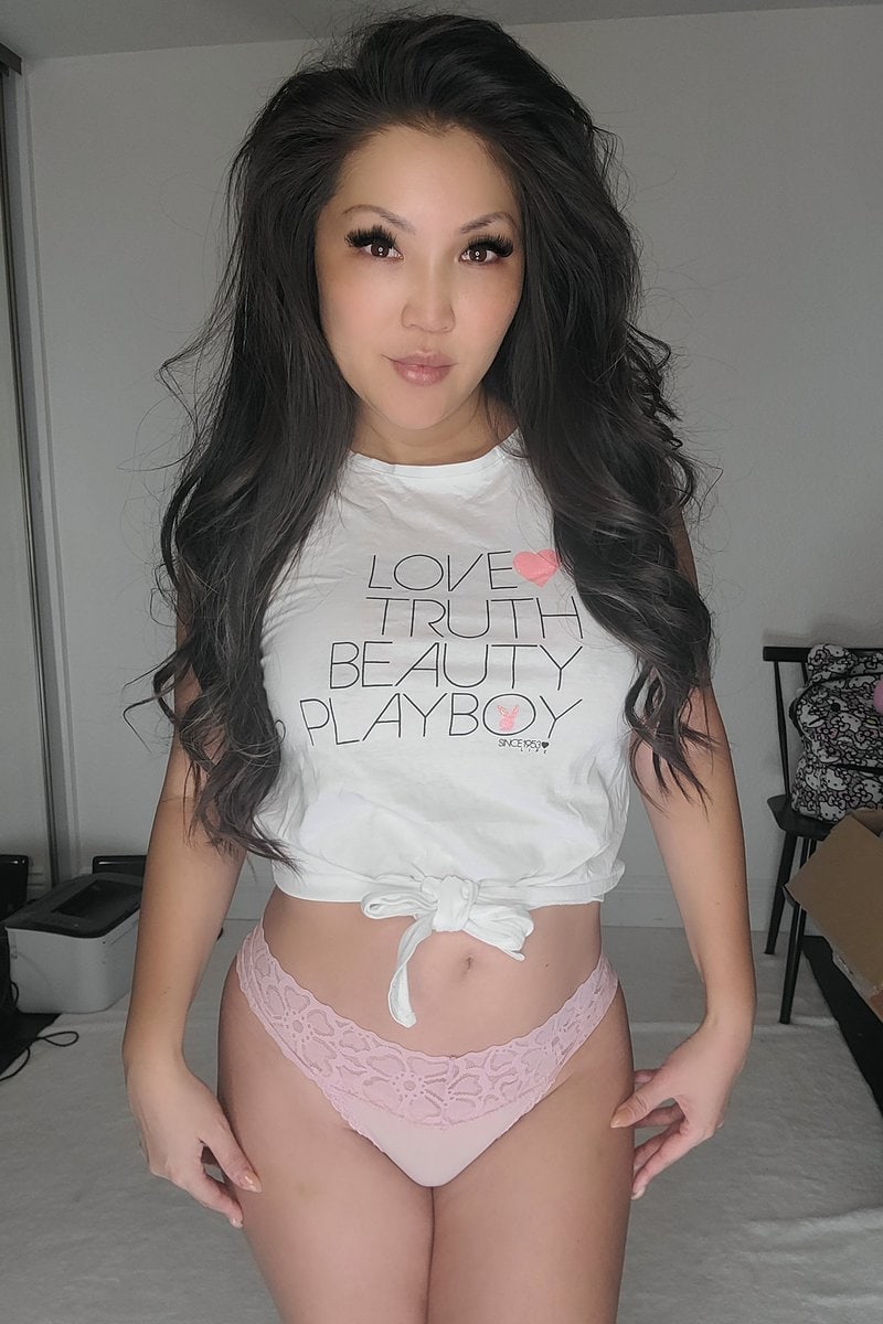 Clothing Tia Kai's worn Playboy top and pink thong Sweeky